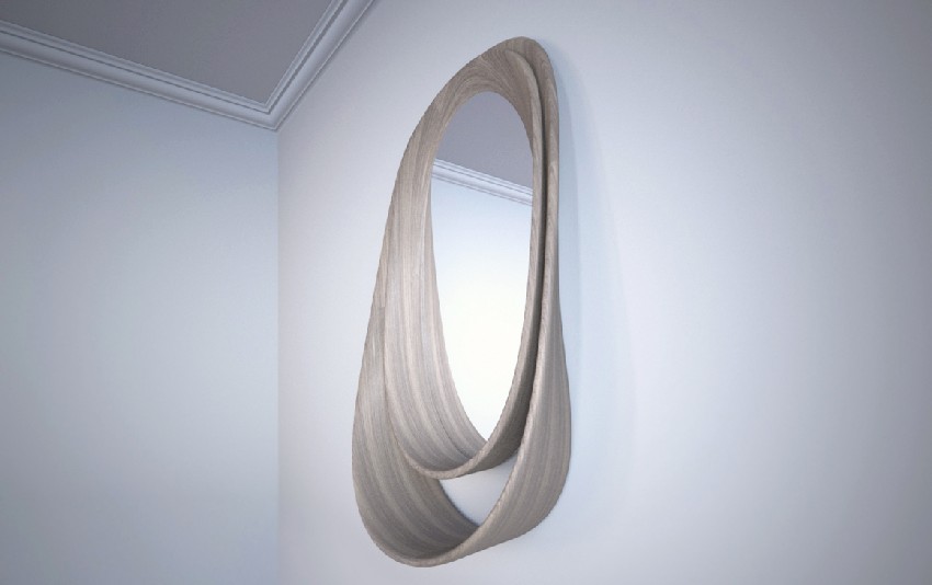 Double Loop mirror in light wood, made of two curved bands of solid timber