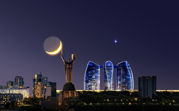 Taryan Towers illuminated at night in the Kyiv skyline
